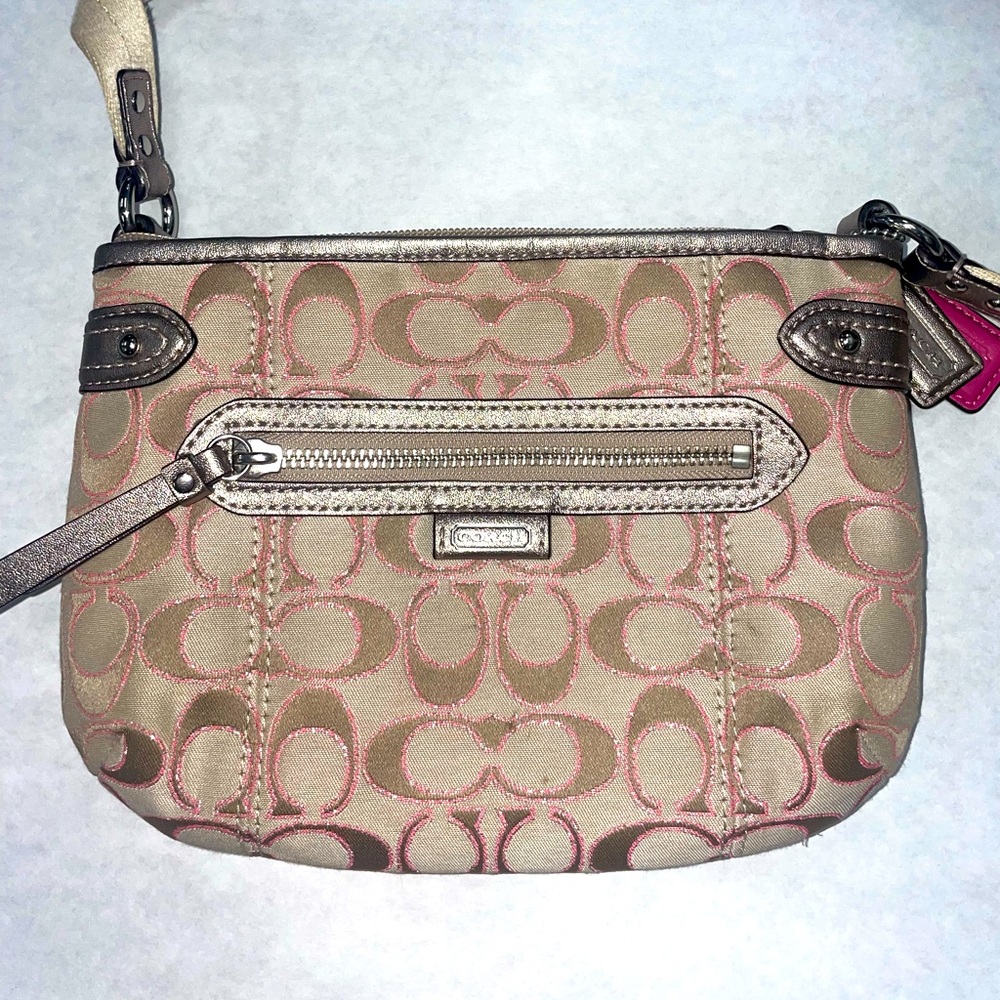 COACH crossbody purse.